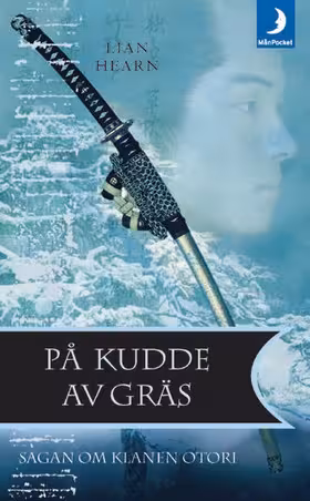 På kudde av gräs